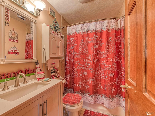 bathroom featuring vanity, a textured ceiling, toilet, and a shower with shower curtain