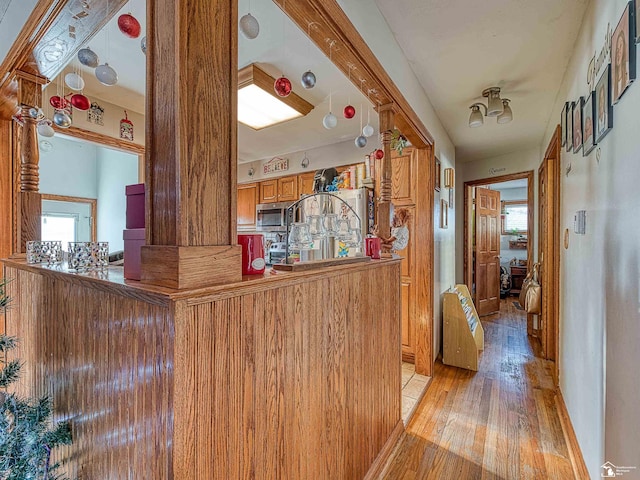 kitchen with light hardwood / wood-style flooring