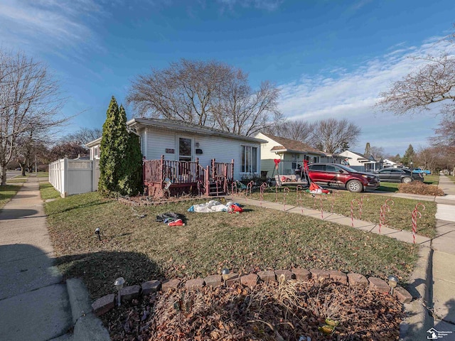 view of front of home with a front yard