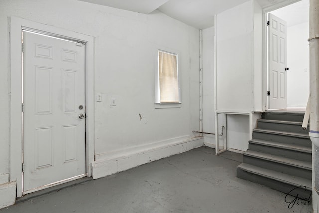 foyer featuring concrete flooring