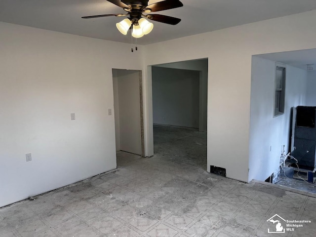 spare room featuring ceiling fan