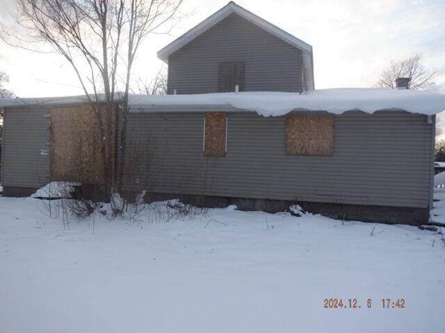 view of snow covered property