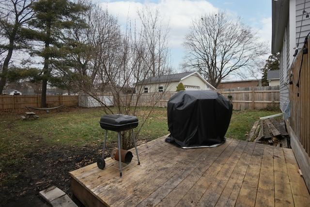 view of patio with a deck and a grill