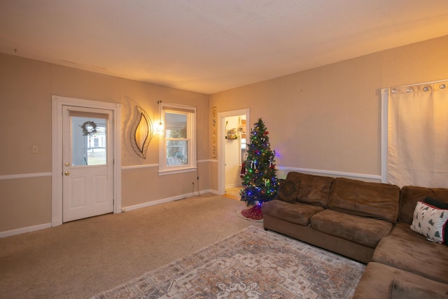 unfurnished living room with carpet