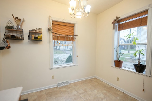 interior space featuring an inviting chandelier