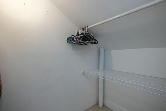 spacious closet featuring lofted ceiling