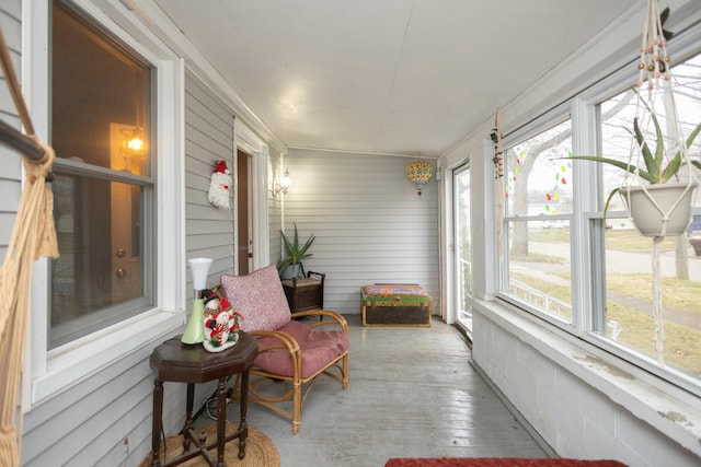 sunroom / solarium featuring plenty of natural light