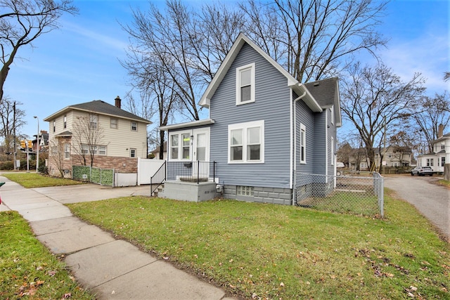 view of front of house with a front lawn