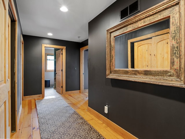 hallway featuring light hardwood / wood-style floors