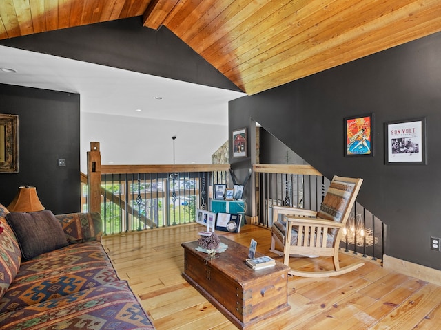 living room featuring beam ceiling, high vaulted ceiling, wooden ceiling, and light wood-type flooring