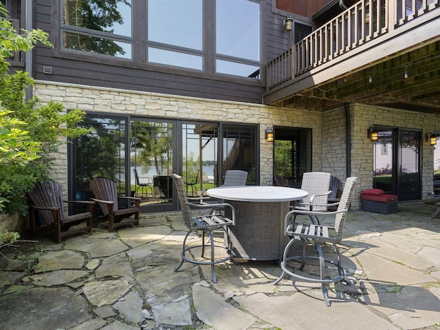 view of patio with a balcony