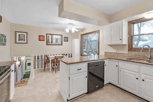 kitchen with kitchen peninsula, white cabinetry, a wealth of natural light, and sink