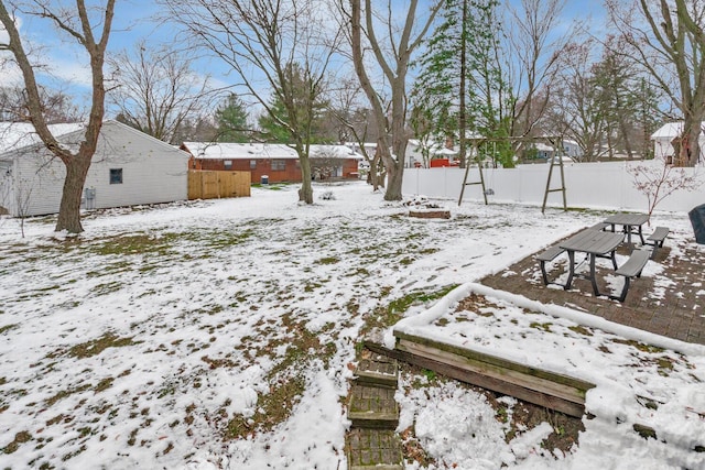 view of yard covered in snow