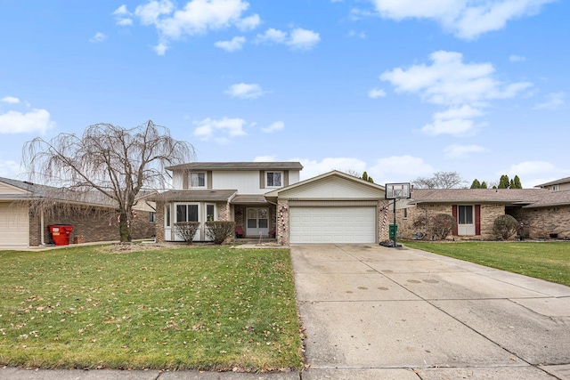 view of front of property with a garage and a front lawn