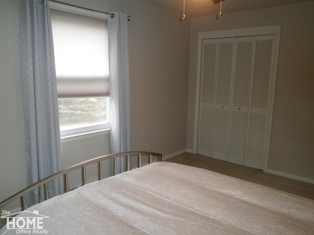 unfurnished bedroom with a closet