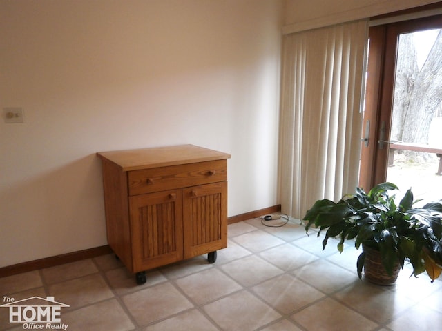 interior space featuring light tile patterned floors