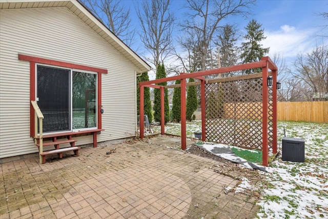 view of snow covered patio