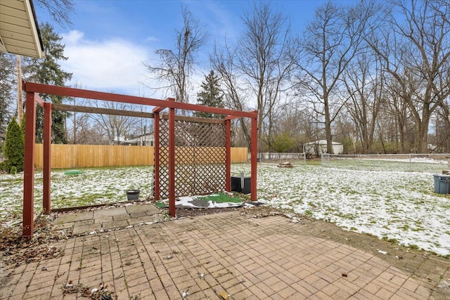 view of snow covered patio