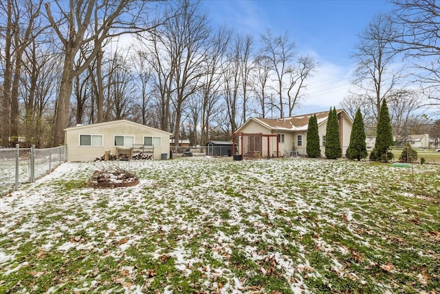 view of yard layered in snow