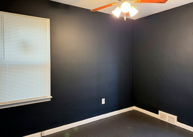 unfurnished room featuring hardwood / wood-style floors and ceiling fan