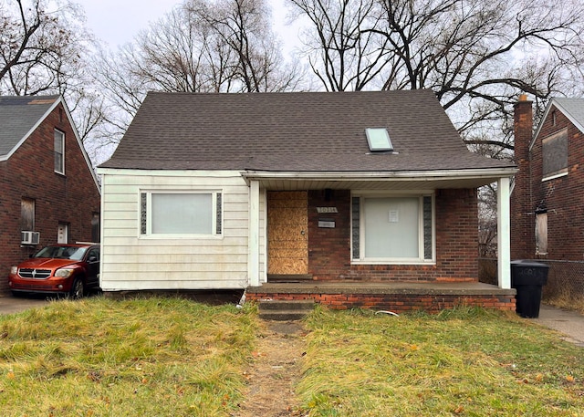 bungalow-style home featuring a porch