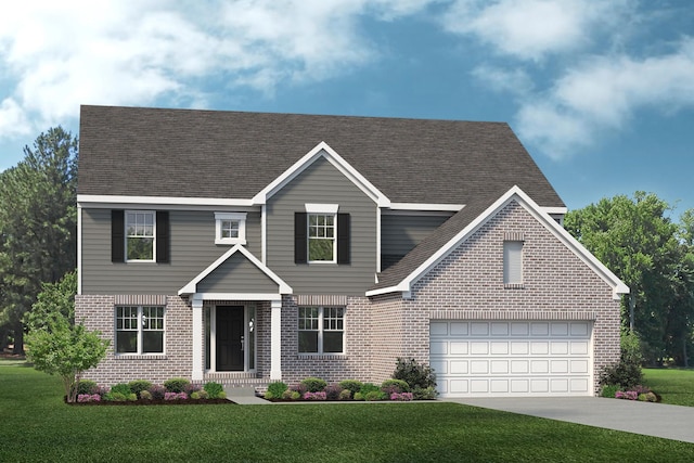 view of front of property featuring a front yard and a garage