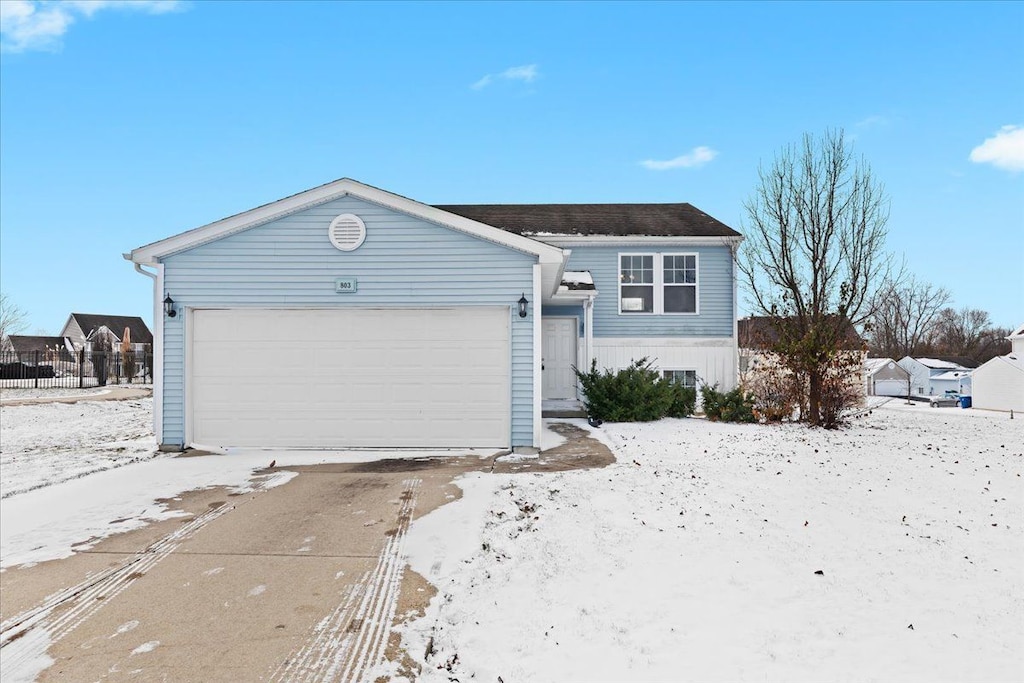 view of front of property with a garage