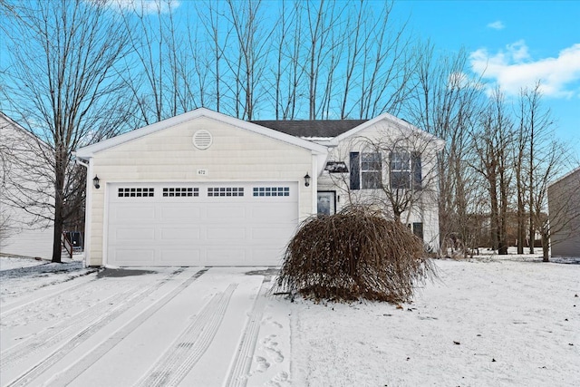 ranch-style house featuring a garage