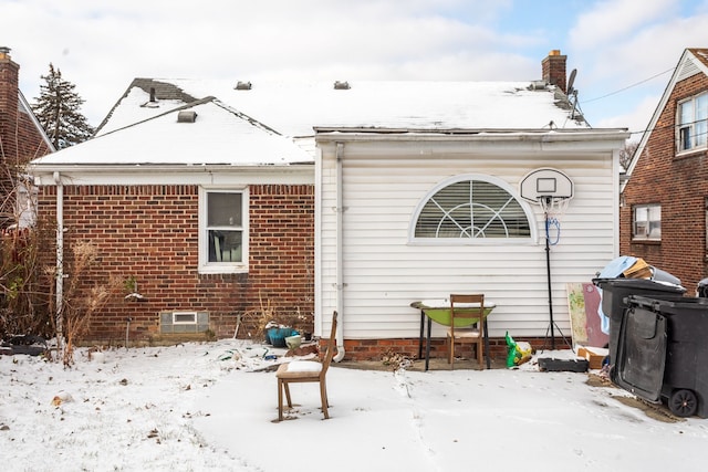 view of snow covered property