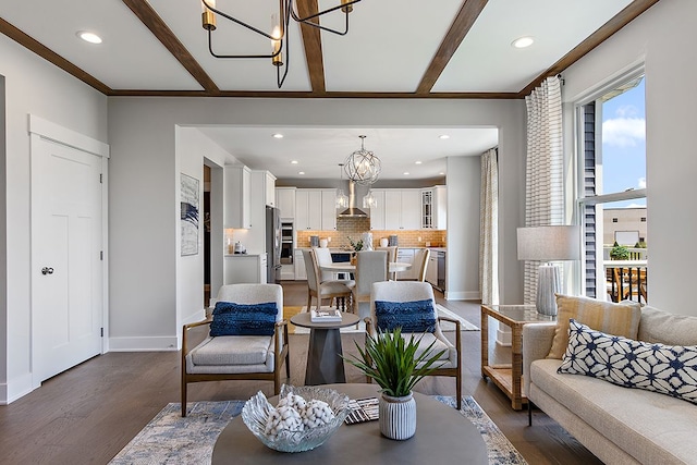 living room featuring a notable chandelier, dark hardwood / wood-style floors, ornamental molding, and beamed ceiling