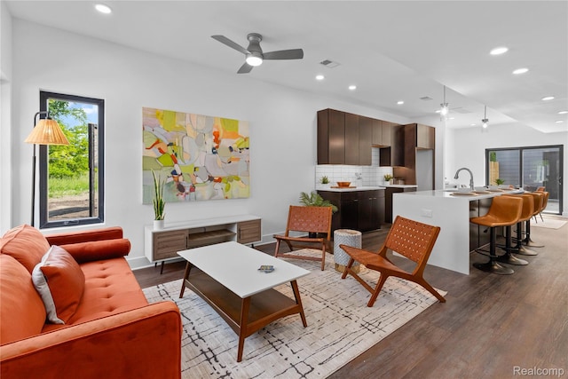 3422 Cochrane St Unit 1, Detroit, MI 48208 - living area featuring a ceiling fan, wood finished floors, and recessed lighting