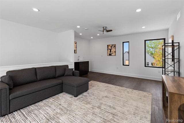 3422 Cochrane St Unit 1, Detroit, MI 48208 - living room with dark wood-style floors, recessed lighting, baseboards, ceiling fan, and wet bar
