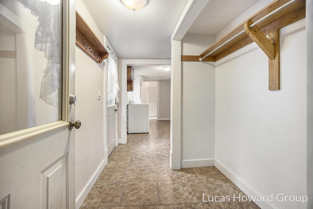 hall featuring washer / clothes dryer