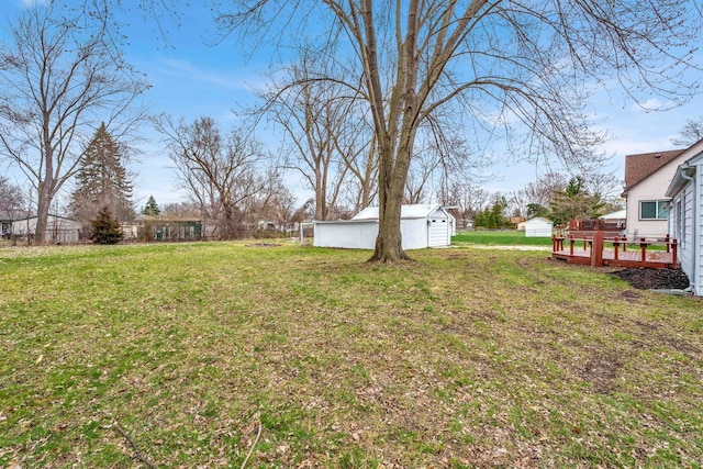 view of yard with a deck