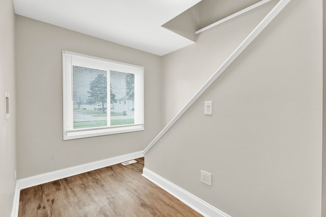 empty room with light wood-type flooring