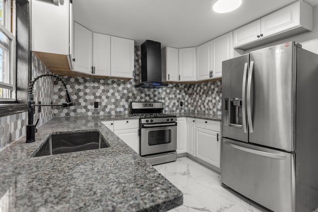 kitchen with sink, wall chimney exhaust hood, decorative backsplash, white cabinetry, and stainless steel appliances