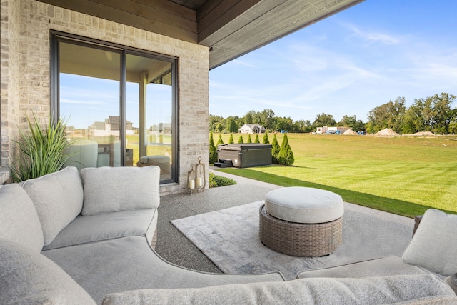 view of patio / terrace featuring a hot tub