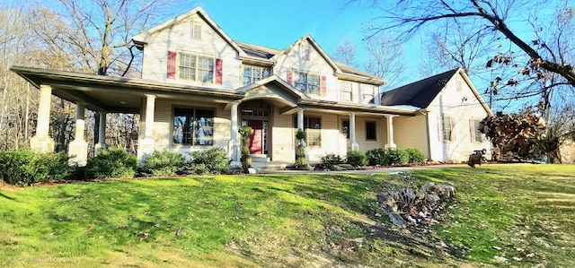 view of front facade featuring a porch and a front lawn