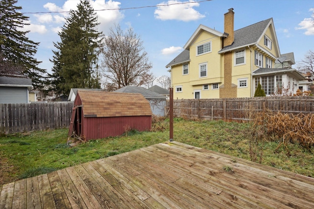 deck with a storage shed