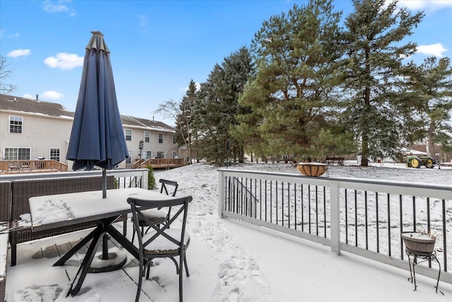 view of snow covered patio