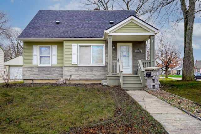 bungalow with a front lawn