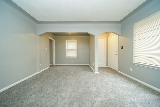 spare room with carpet flooring