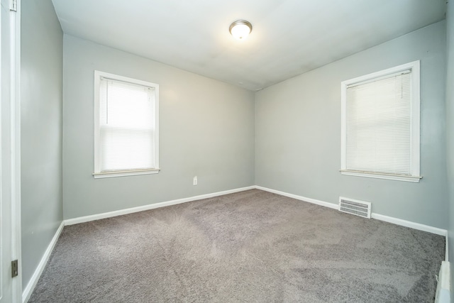 view of carpeted spare room