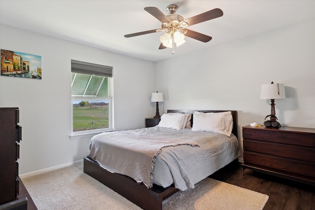 bedroom featuring baseboards and a ceiling fan