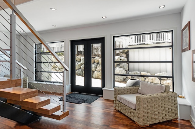 entryway with hardwood / wood-style flooring