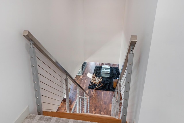 staircase with a high ceiling