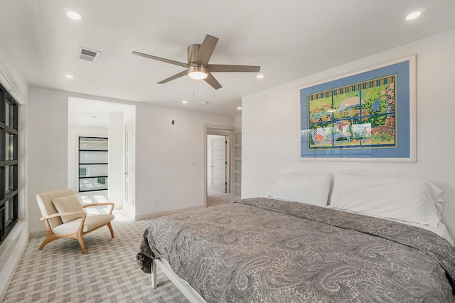 carpeted bedroom featuring ceiling fan