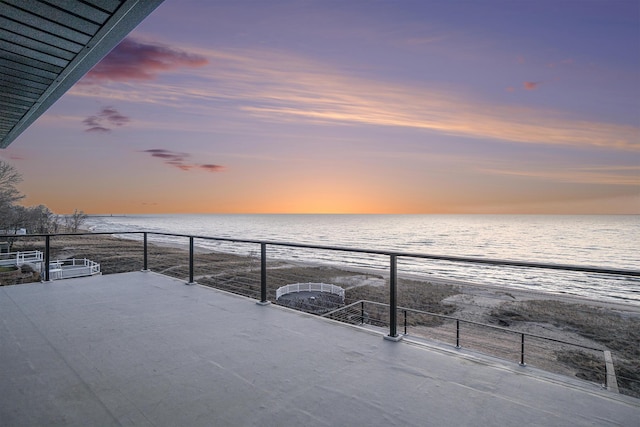 exterior space featuring a water view and a balcony