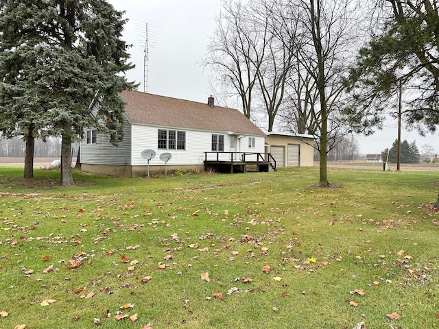 view of yard with a wooden deck