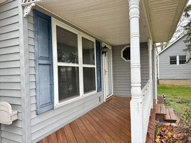 wooden deck featuring covered porch